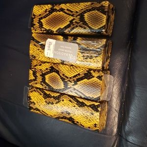 Foster Grant yellow and black eyeglass case.